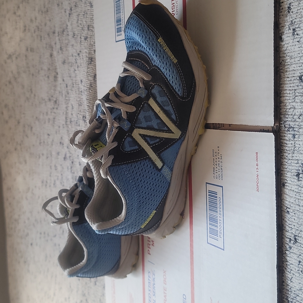 Women's New Balance 310's size 7.5 Powder Blue, Grey and   a Neon Yellow Trim